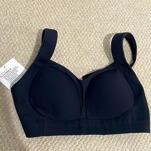 Lululemon sports bra. Ta Ta Tamer III. size 32DD. Black. Never worn. Brand new.